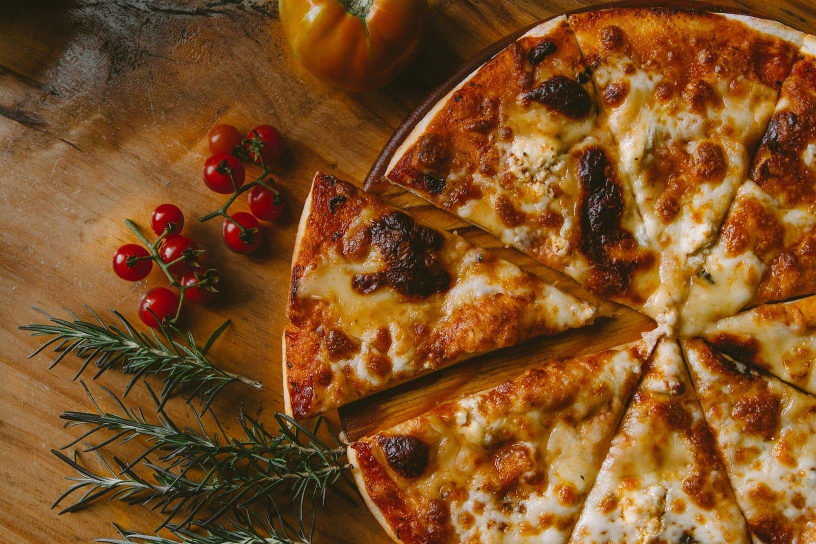 Freshly baked pizza topped with basil